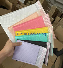 การออกแบบโลโก้ตามสั่ง กระเป๋าส่งพับสีสัน ที่เหมาะสมสําหรับการส่งที่ปลอดภัยและมีสไตล์