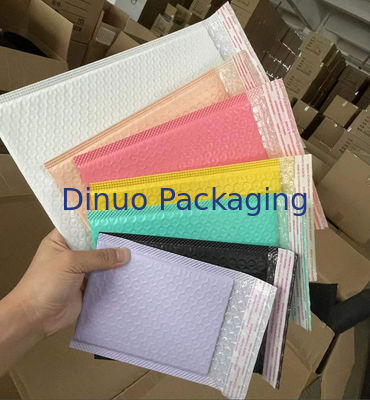การออกแบบโลโก้ตามสั่ง กระเป๋าส่งพับสีสัน ที่เหมาะสมสําหรับการส่งที่ปลอดภัยและมีสไตล์